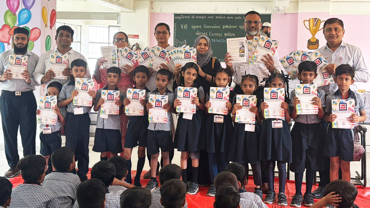 KP Human Development Foundation Distributes Educational Notebooks to Students of Charak Muni Nagar Primary School No. 149, at Adajan Patiya, Surat 1